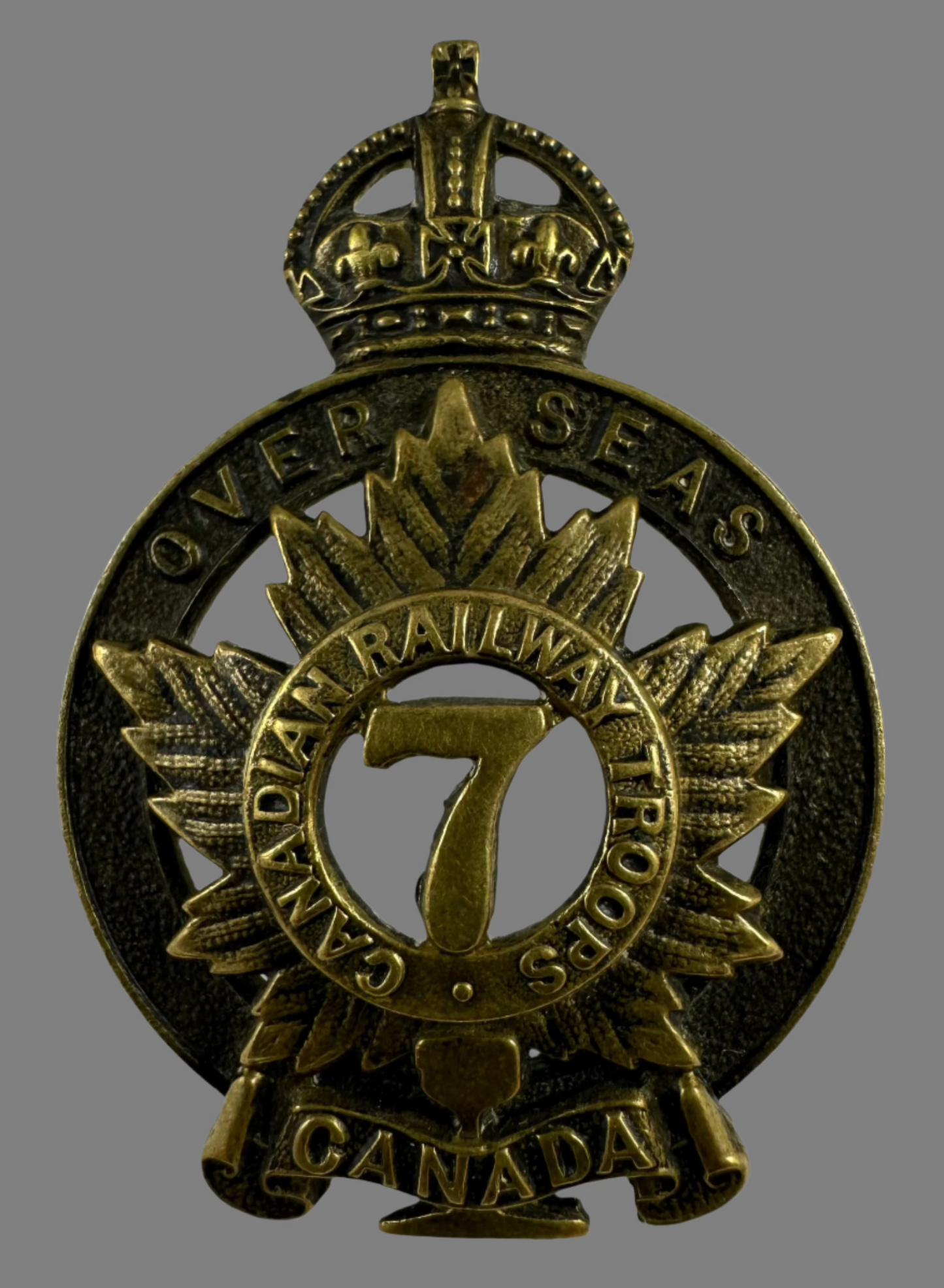 WWI - 7th Canadian Railway Troops Cap Badge - Dark Bronze Finish