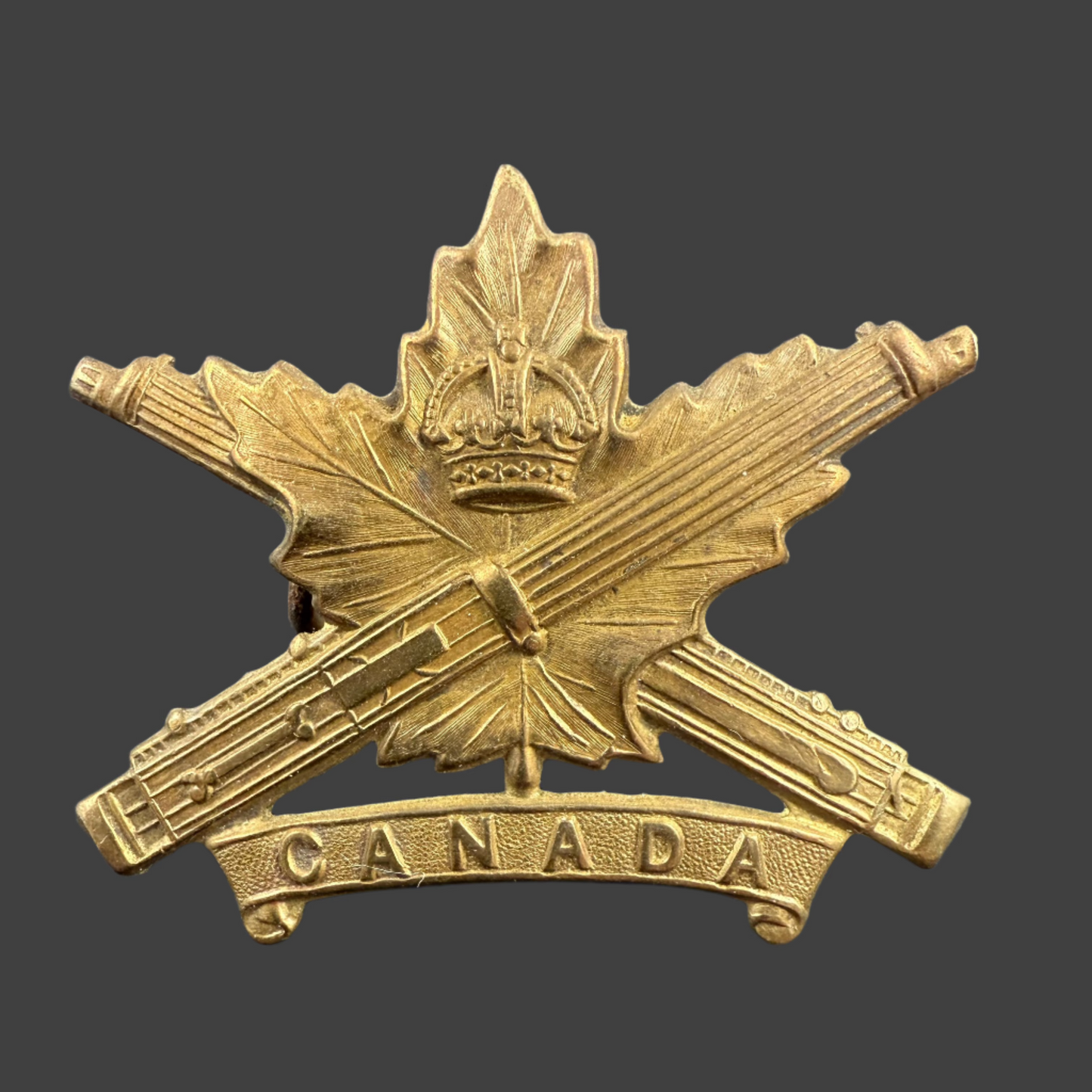 WWI - CEF Cap Badge - Canadian Machine Gun Corps