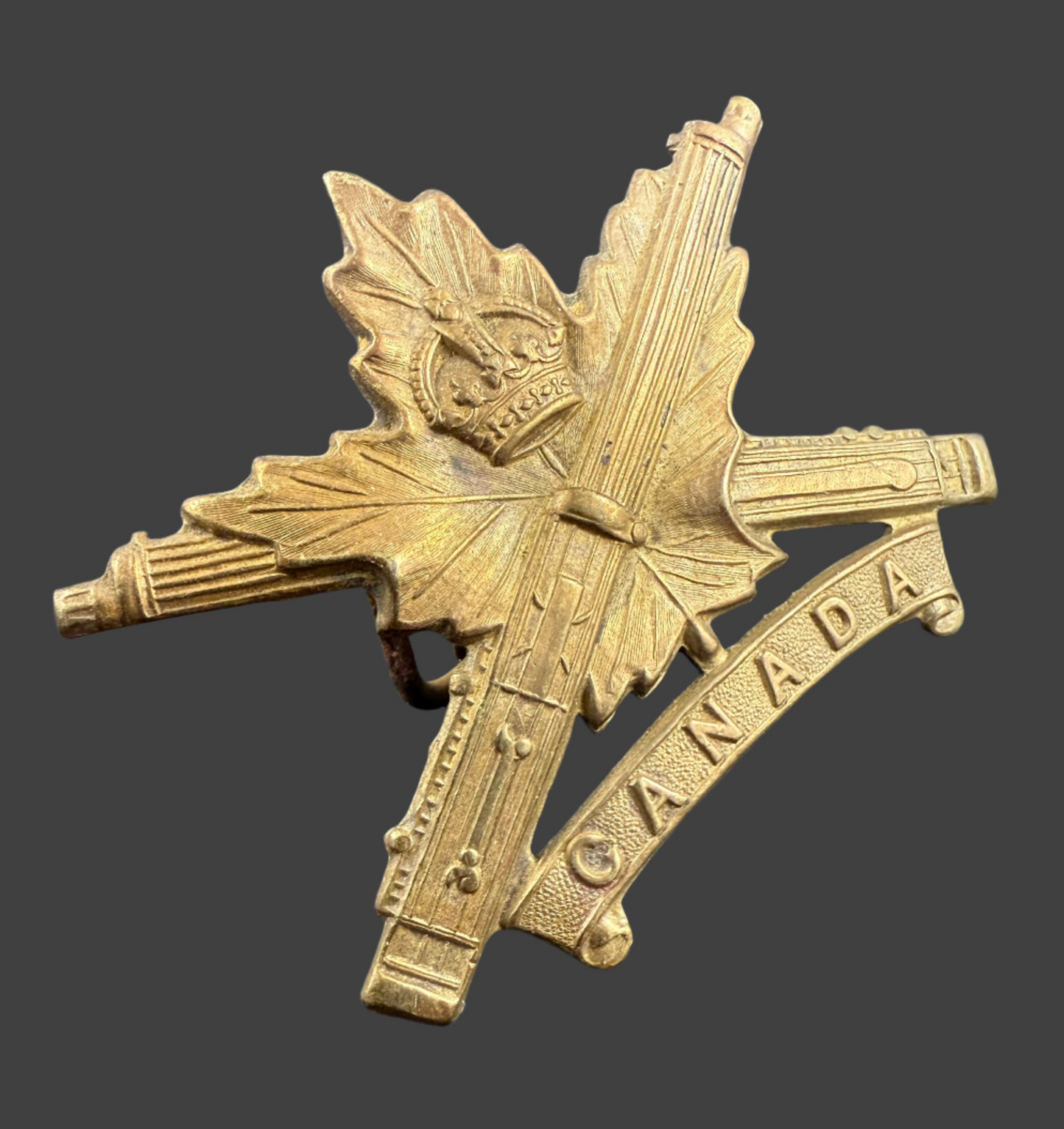 WWI - CEF Cap Badge - Canadian Machine Gun Corps