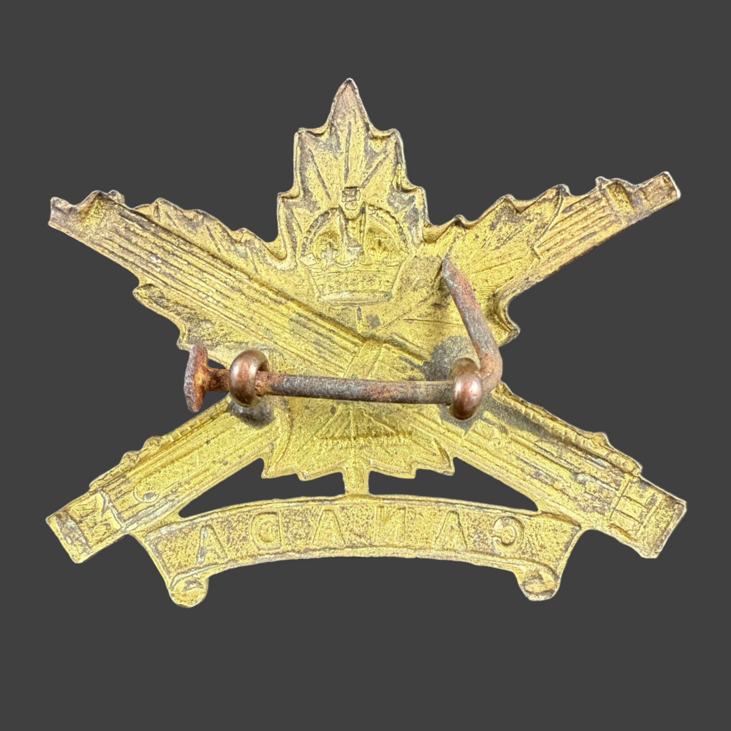 WWI - CEF Cap Badge - Canadian Machine Gun Corps