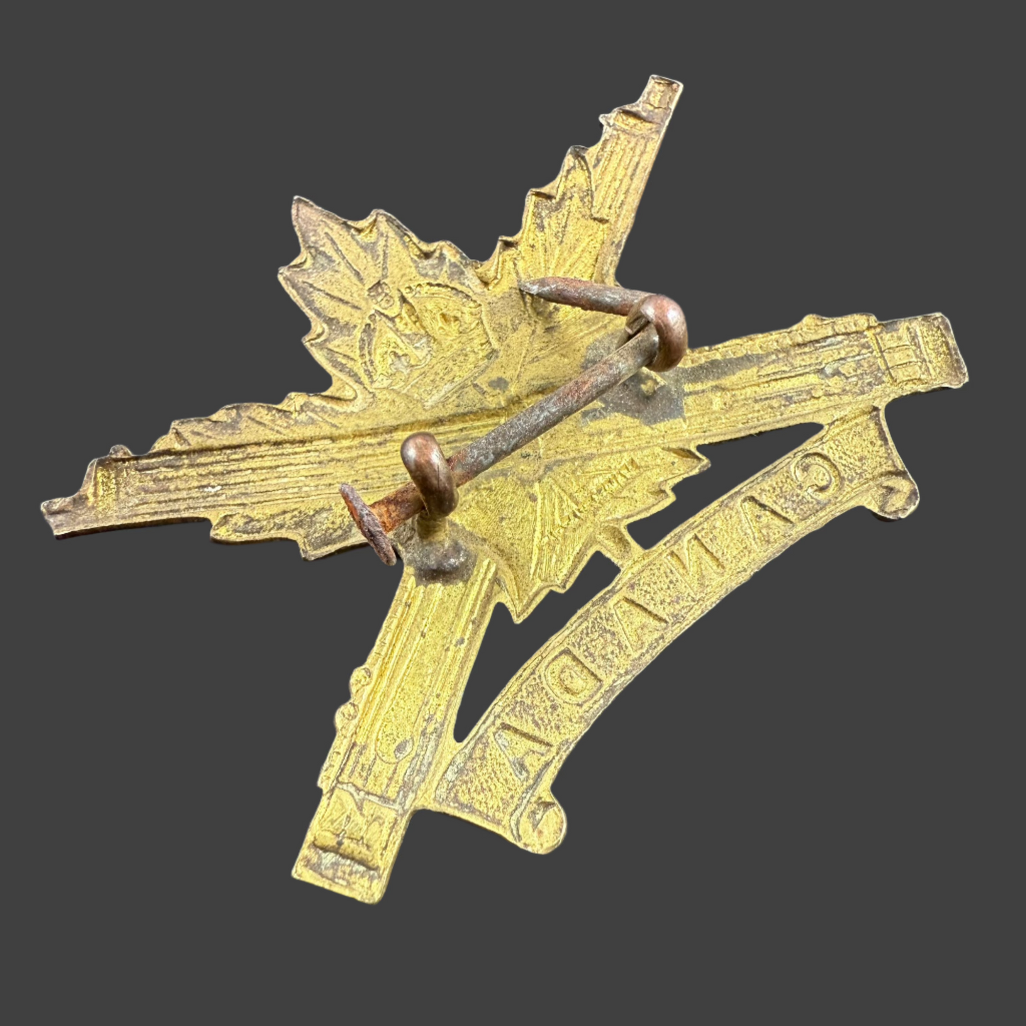 WWI - CEF Cap Badge - Canadian Machine Gun Corps