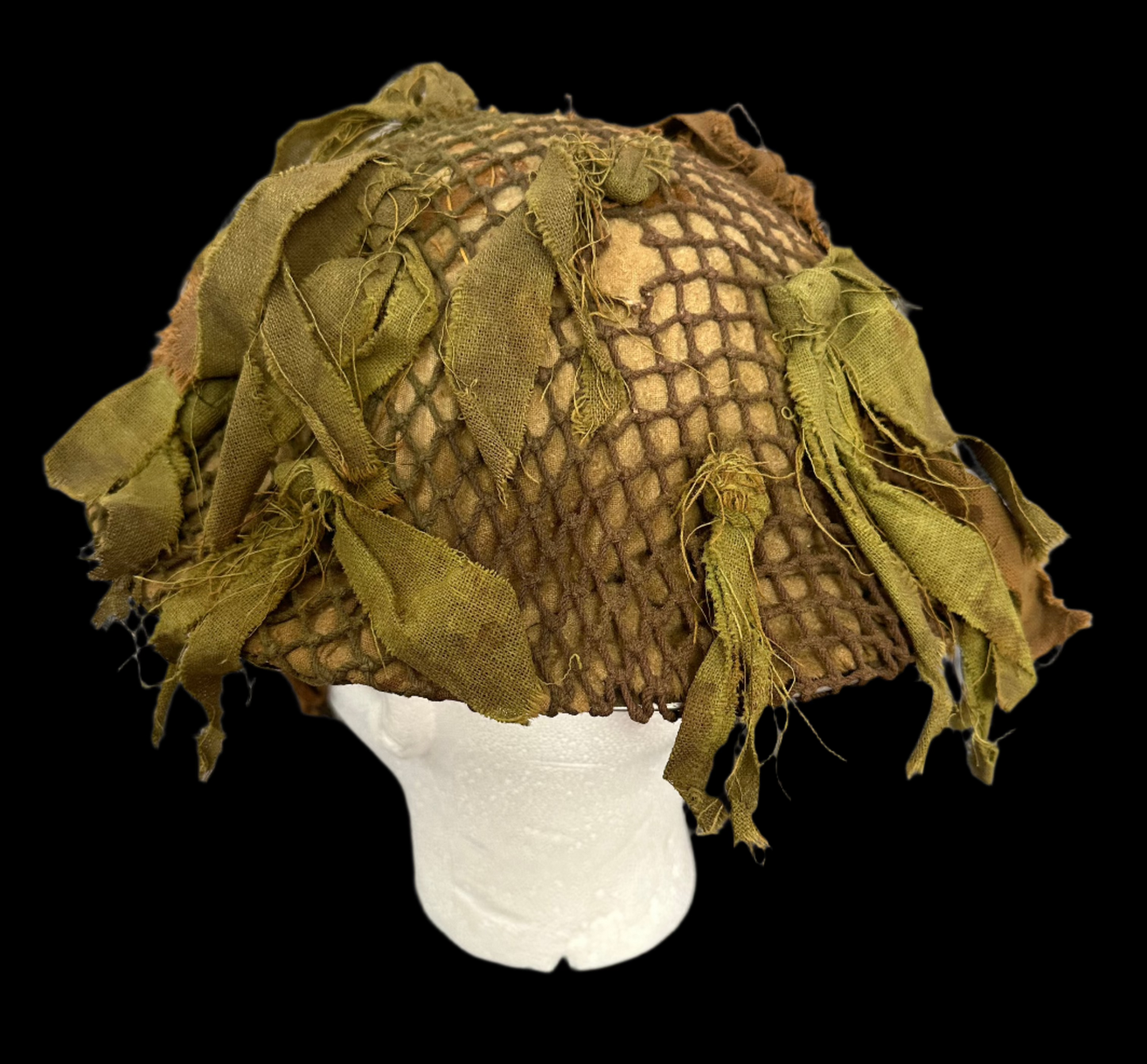 WWII Canadian Helmet with camouflage cover and scrim