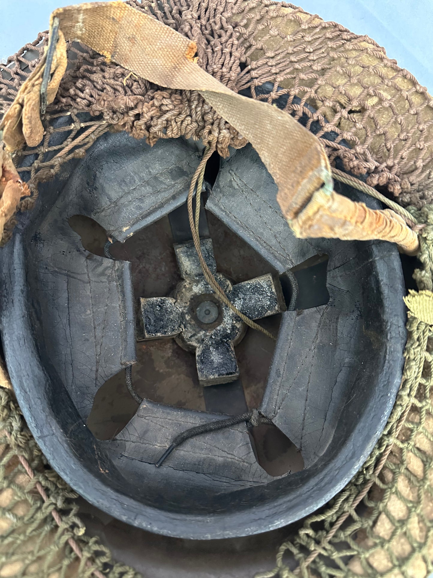 WWII Canadian Helmet with camouflage cover and scrim