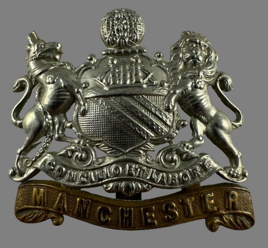 British WWI  - Manchester Regiment Cap Badge